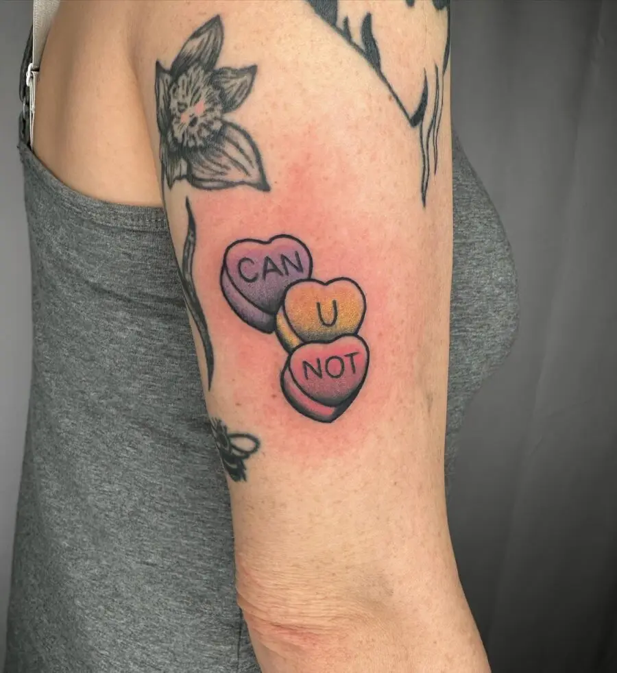 Charming candy heart tattoo with sweet words