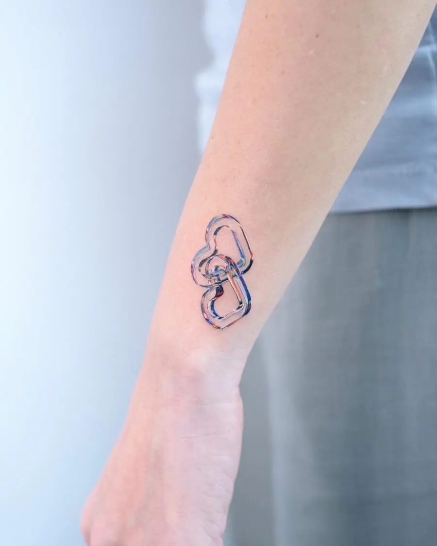 Playful candy heart tattoo design on arm