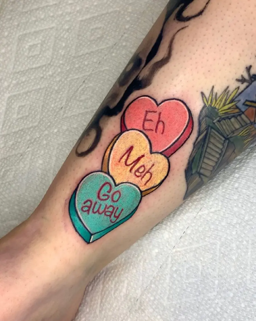 Playful heart tattoos with quirky phrases