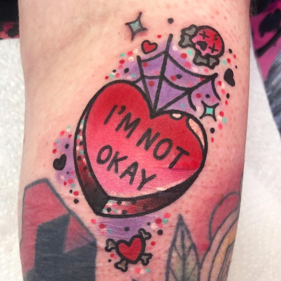 Bold candy heart tattoo expression of emotion