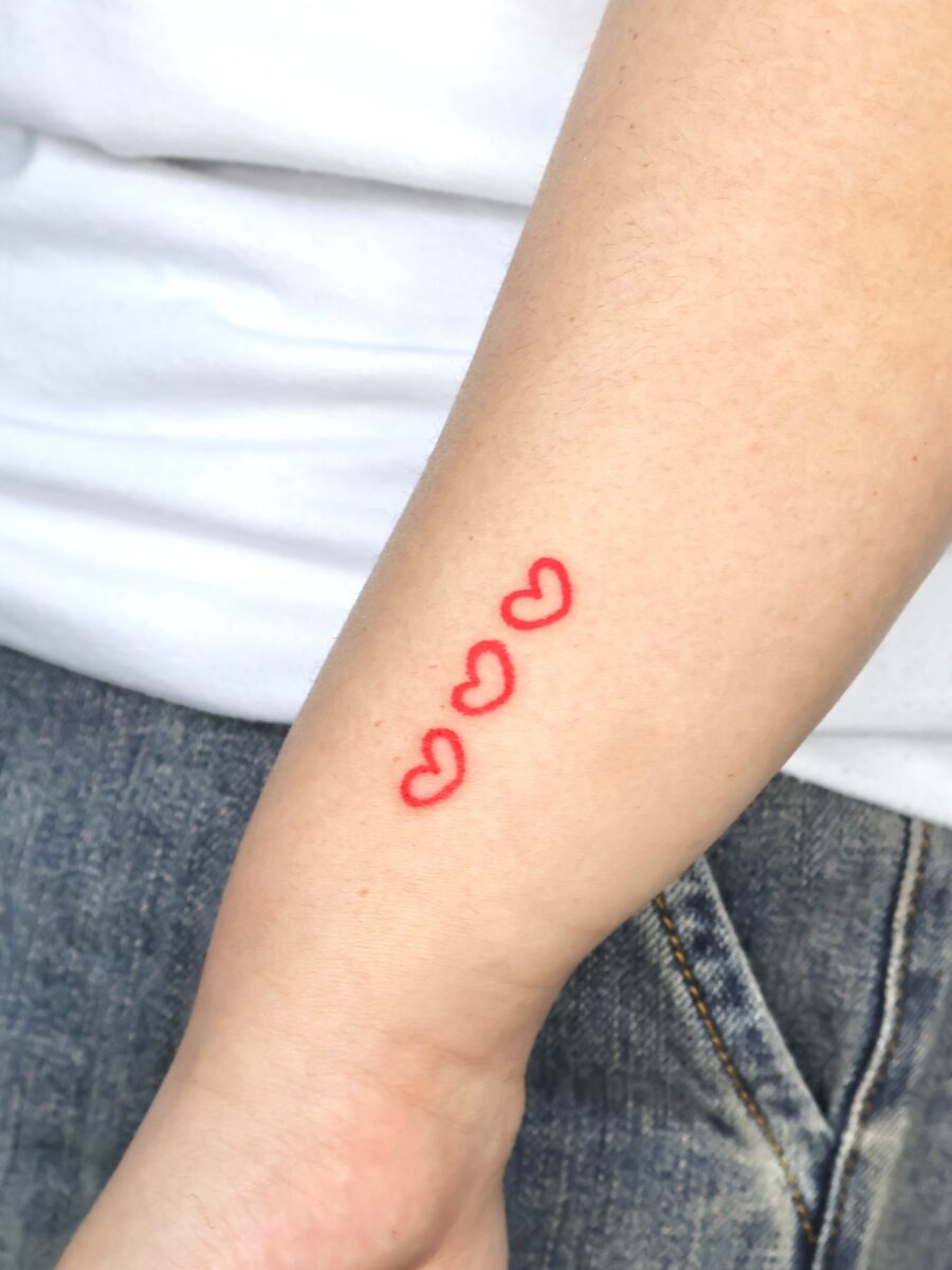 Charming Red Candy Heart Tattoo Design