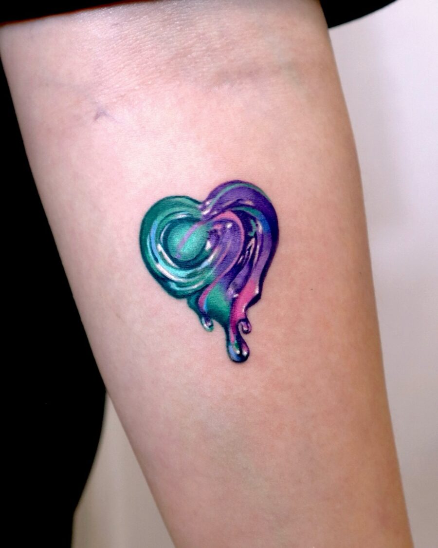 Vivid drippy heart tattoo design with color blend