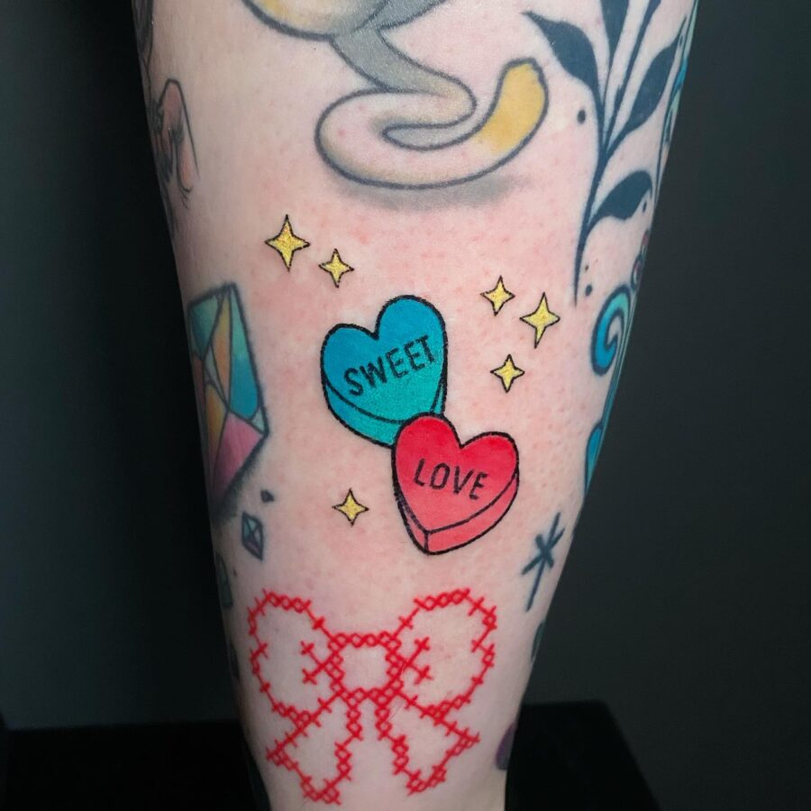 Colorful candy heart tattoos with playful vibes