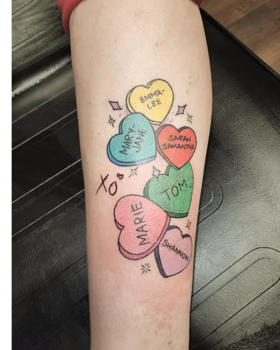 Whimsical candy heart tattoos with playful names