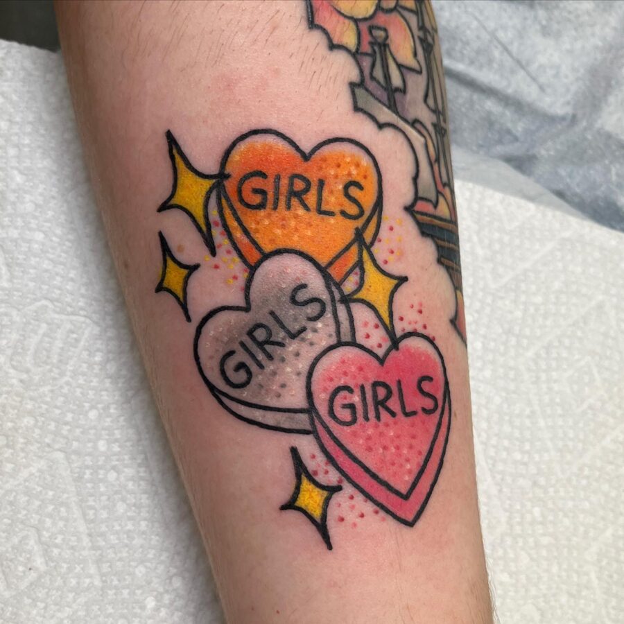 Vibrant candy heart tattoos with a playful vibe