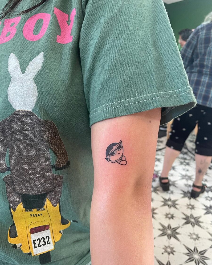 Cute cartoon heart tattoo on arm
