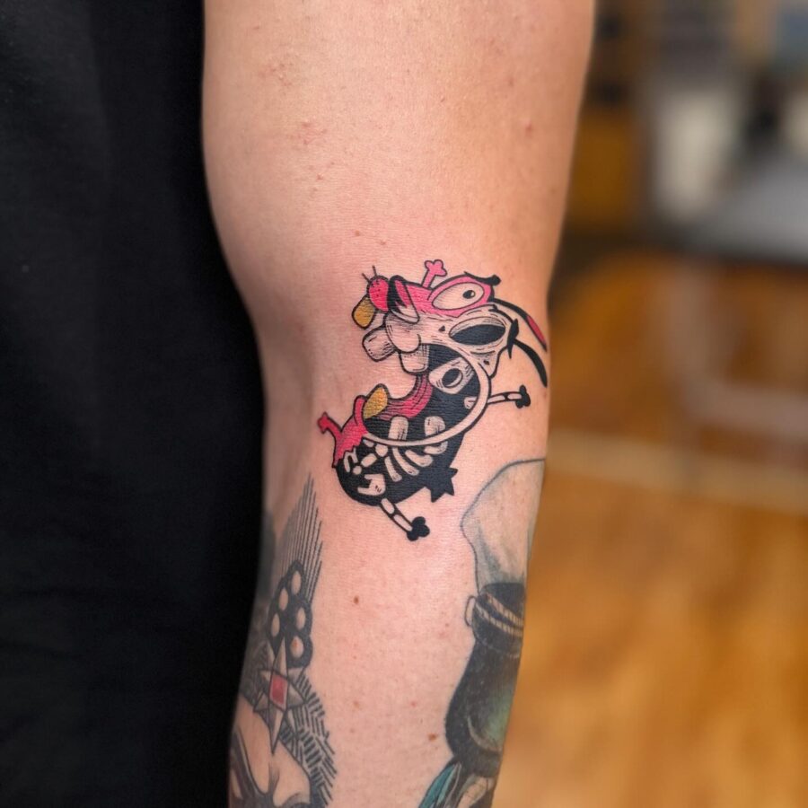 Whimsical cartoon tattoo with playful characters