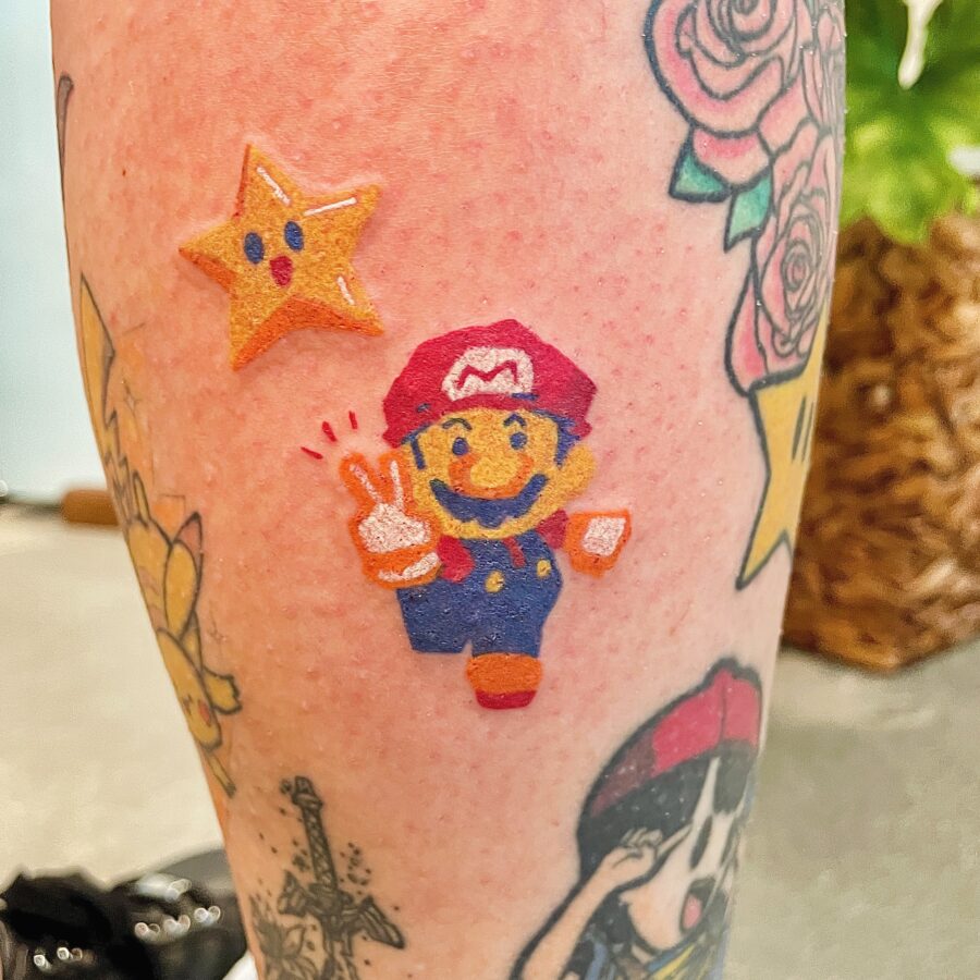 Whimsical Mario Cartoon Tattoo Design
