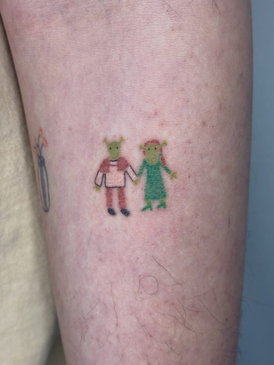 Adorable Shrek and Fiona cartoon tattoo design