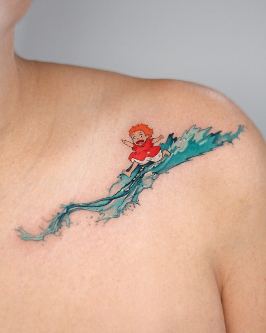 Whimsical surfing boy tattoo on shoulder