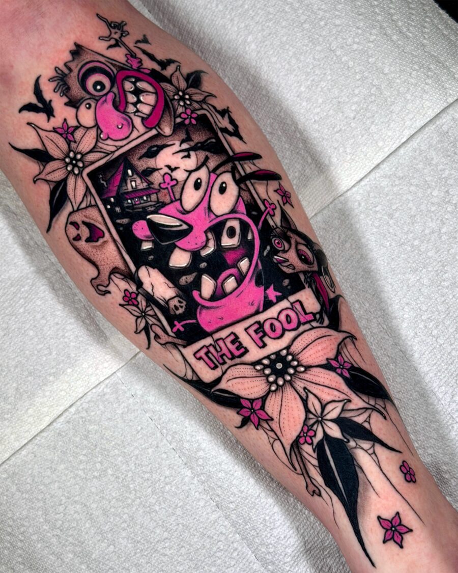Quirky cartoon tattoo with vibrant pink accents