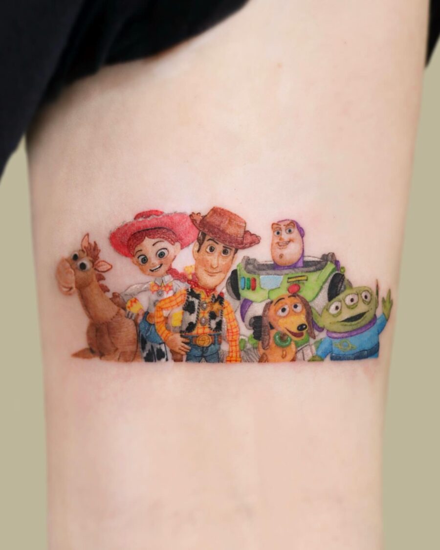 Iconic Toy Story characters in vibrant tattoo art