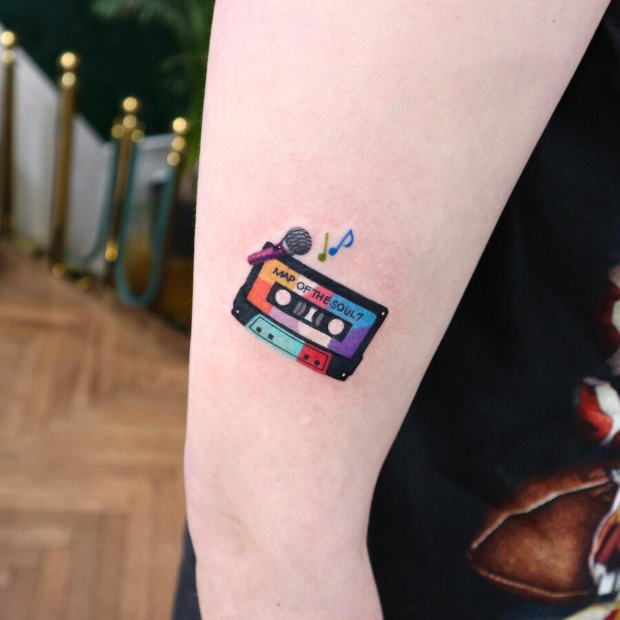 Colorful cassette tattoo capturing musical nostalgia