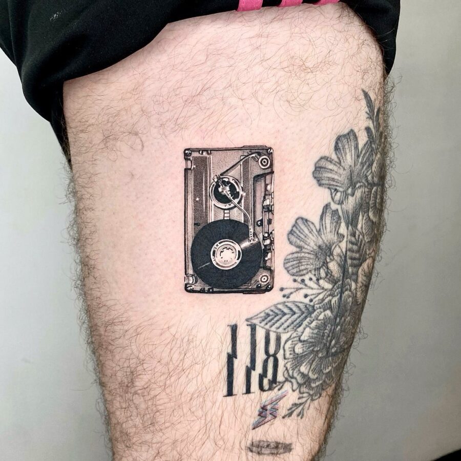 Classic cassette tattoo embodies nostalgia and music love