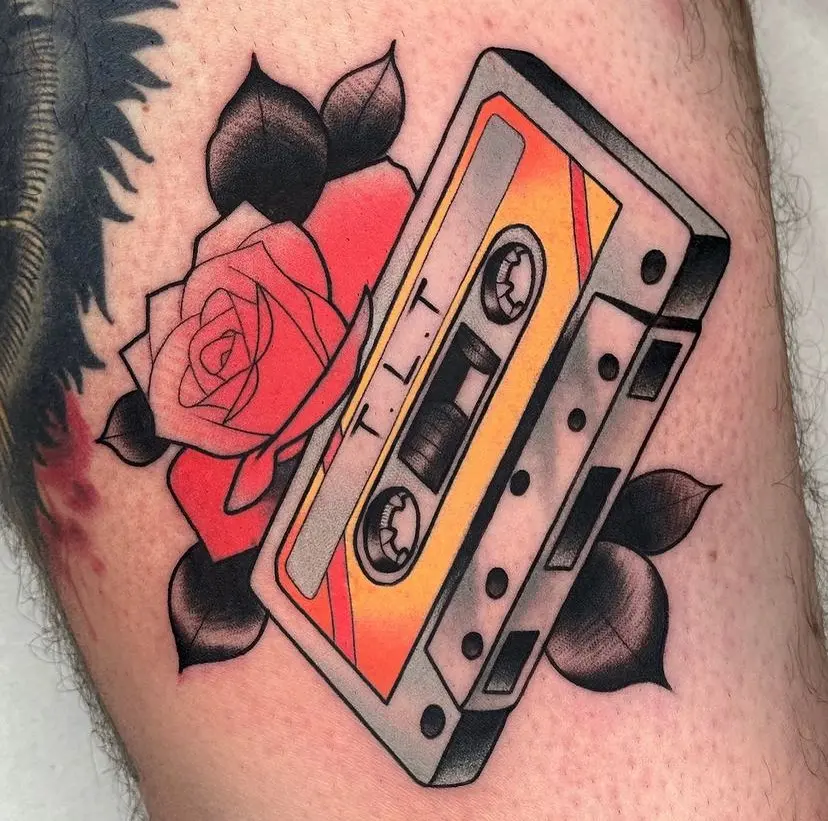A nostalgic cassette tape amidst bold roses