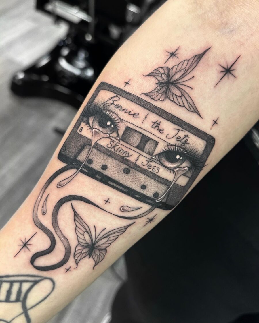 Intricate cassette tape tattoo with vivid details