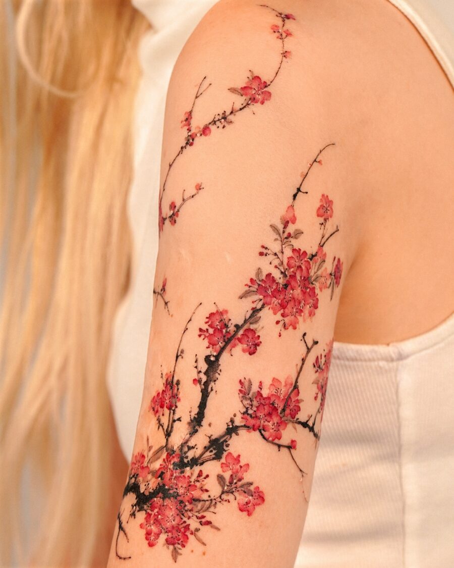 Vibrant Cherry Blossom Half Sleeve Tattoo Art