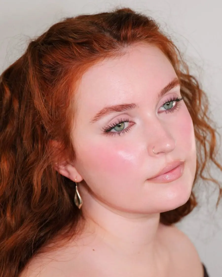 Radiant glow with subtle natural blush.