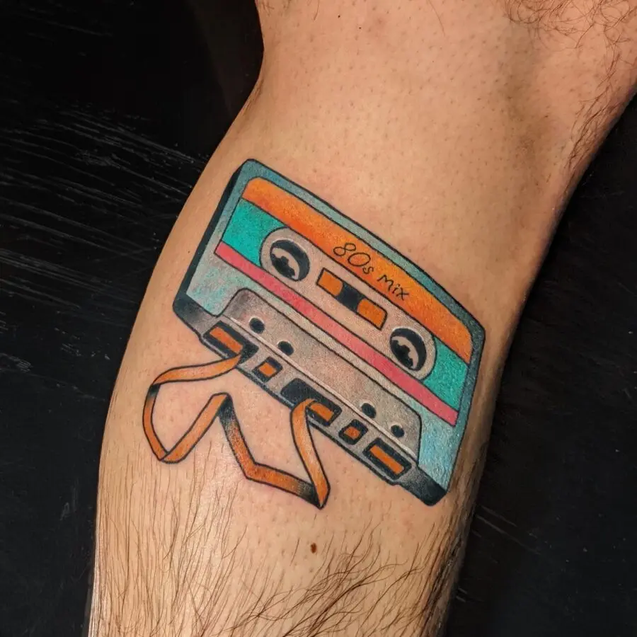 Vibrant 80s mix cassette tattoo masterpiece