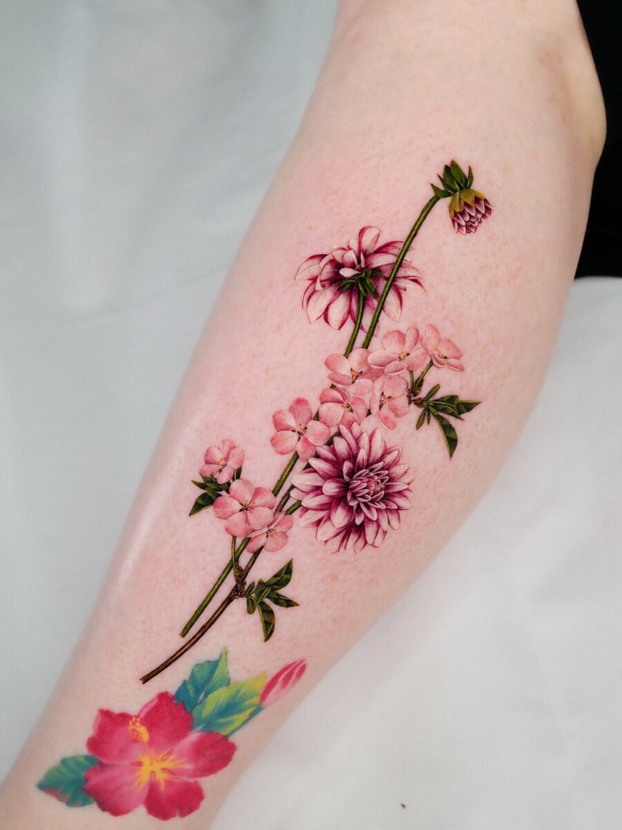 Captivating floral dahlia tattoo design on arm