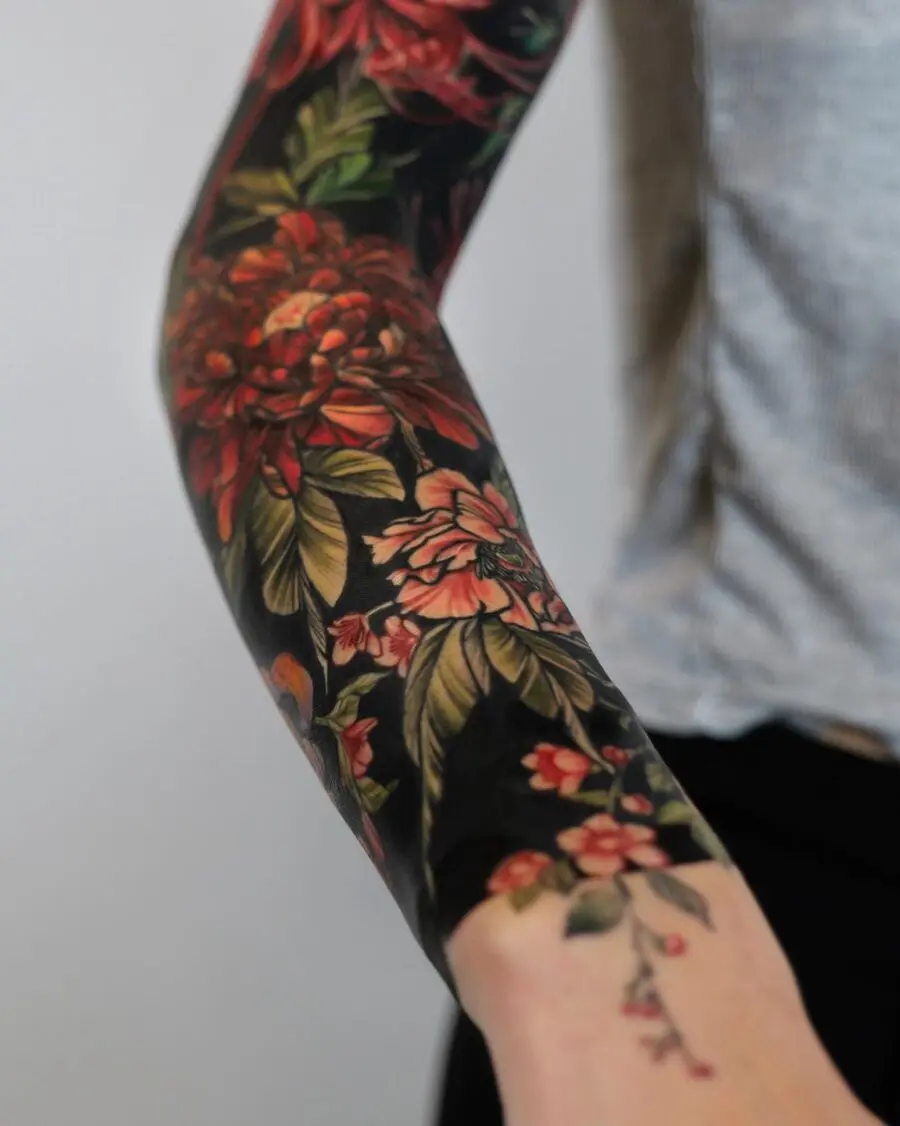 Beautiful floral cover-up tattoo on forearm