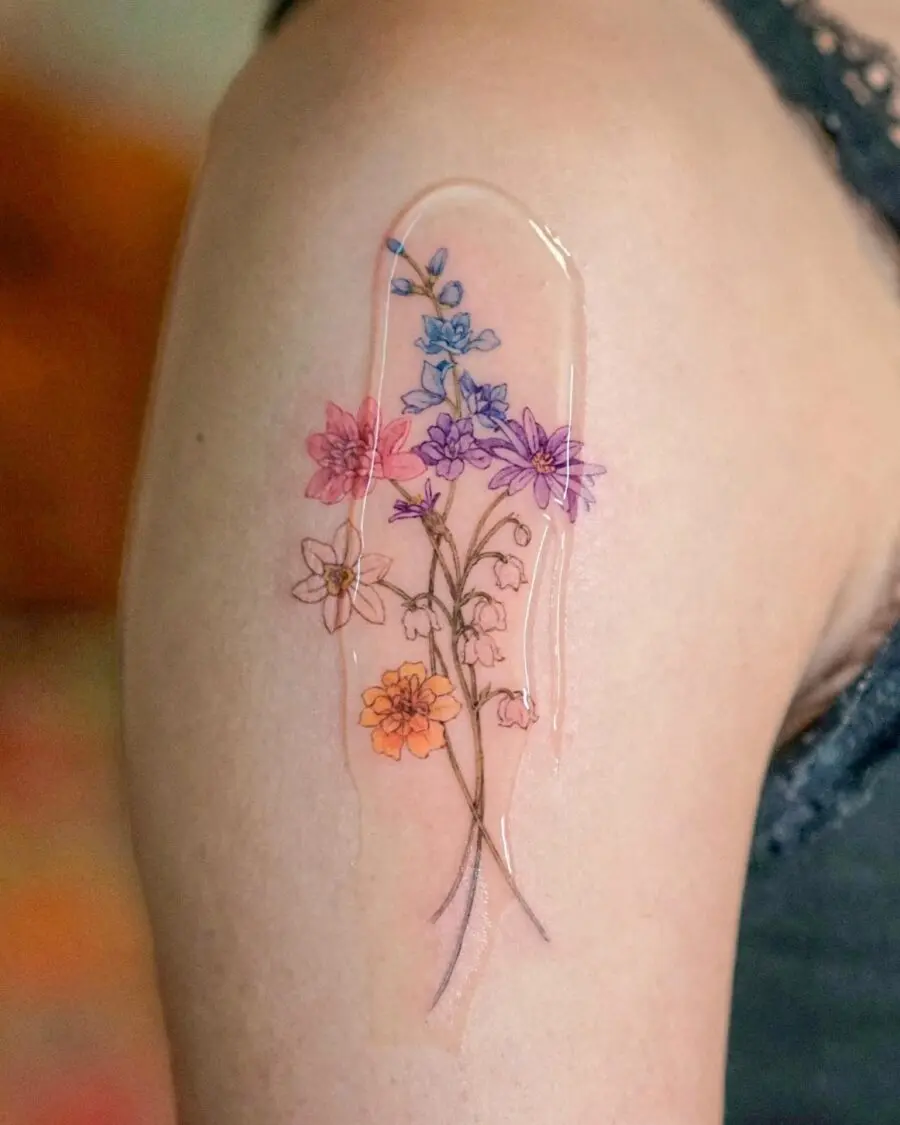 Exquisite floral tattoo with vibrant watercolor hues