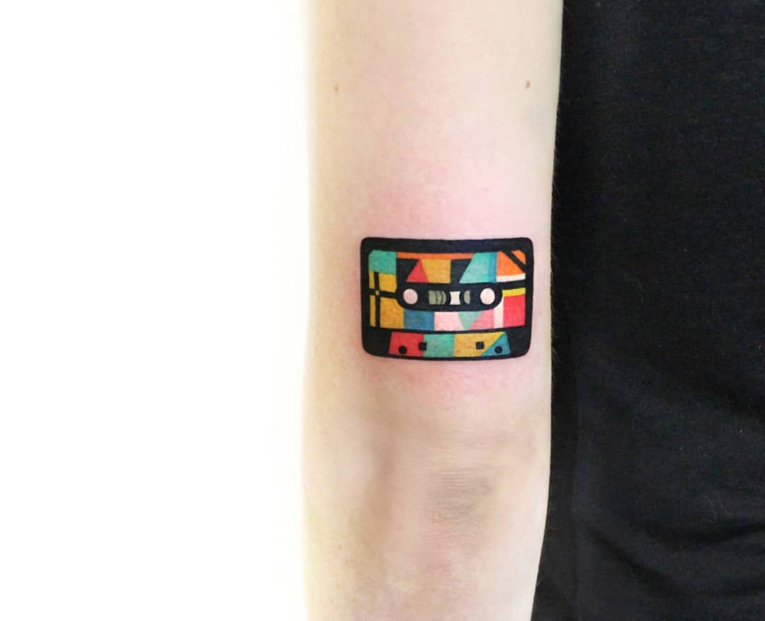 Vibrant geometric cassette tape tattoo design