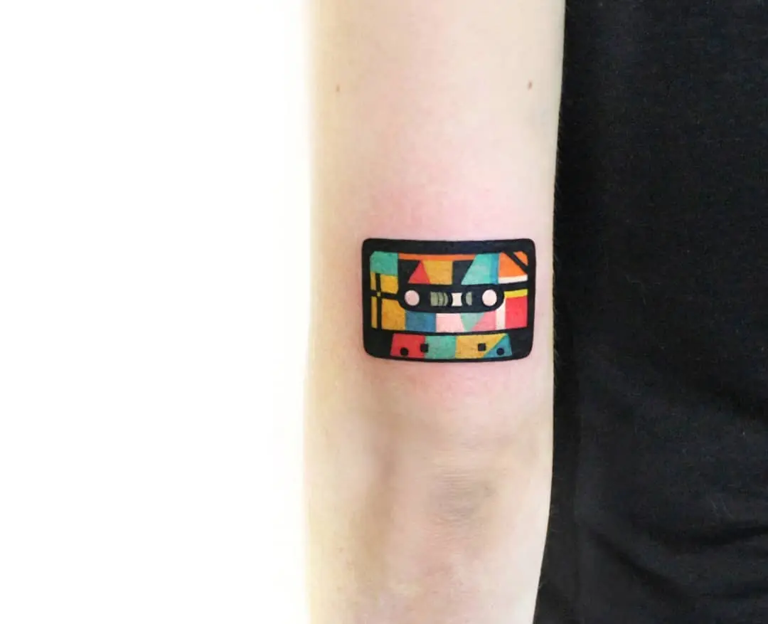 Vibrant geometric cassette tape tattoo design