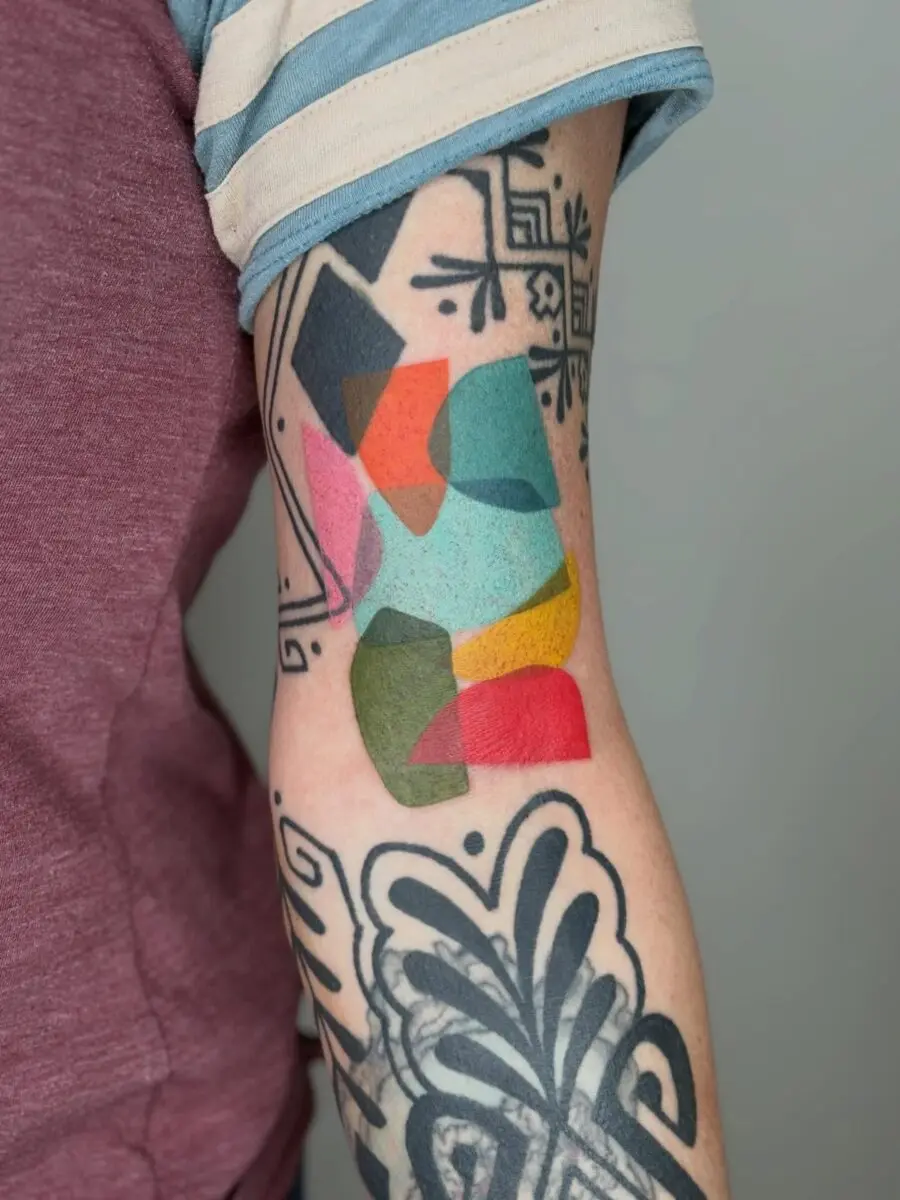 Vibrant geometric shapes for tattoo cover-up