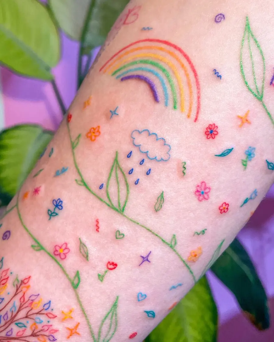 Vibrant Rainbow Baby Tattoo Celebrating Life
