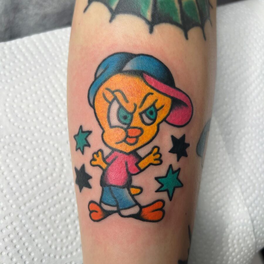 Vibrant Tweety Bird Tattoo with Attitude
