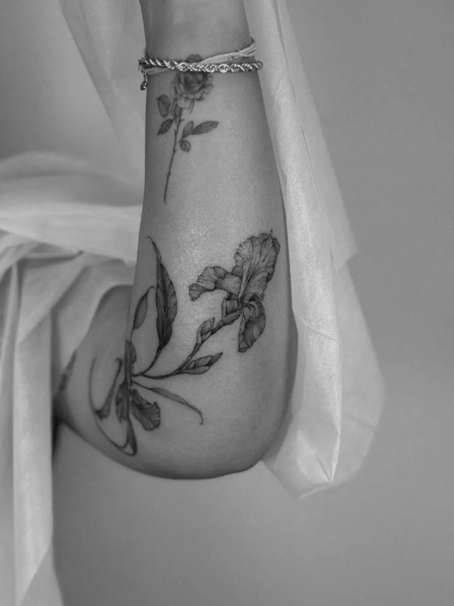 Delicate floral cover-up tattoo design