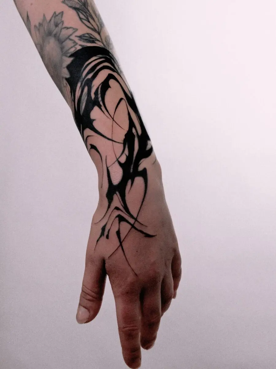 Unique Artistic Black Ink Cover-Up Tattoo