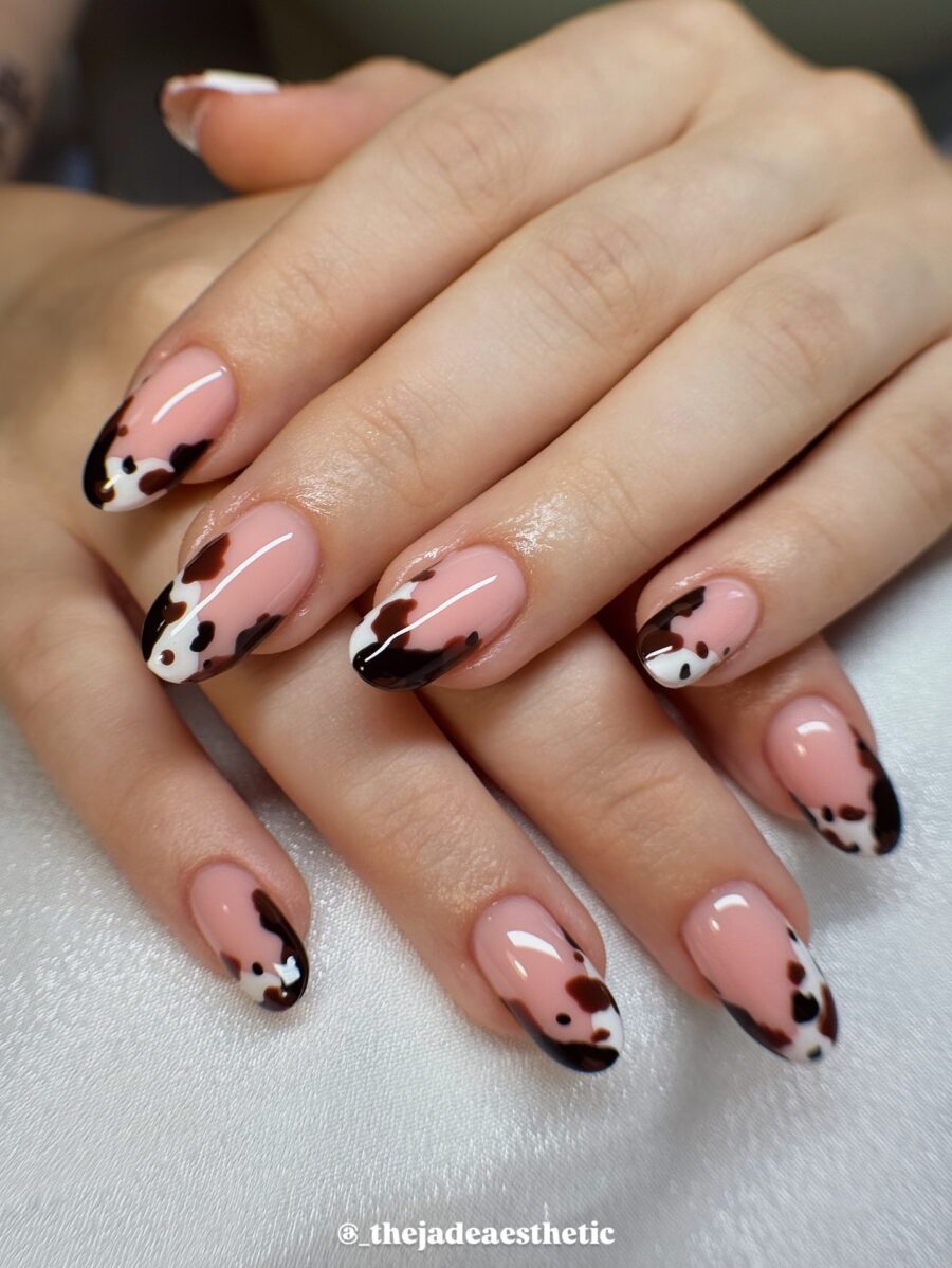 Trendy cow print nails with a playful twist