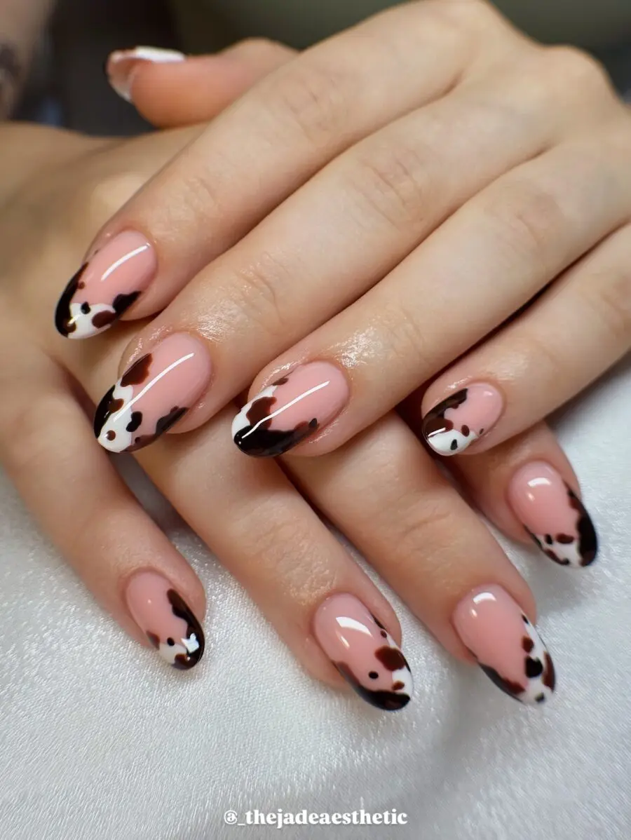 Trendy cow print nails with a playful twist