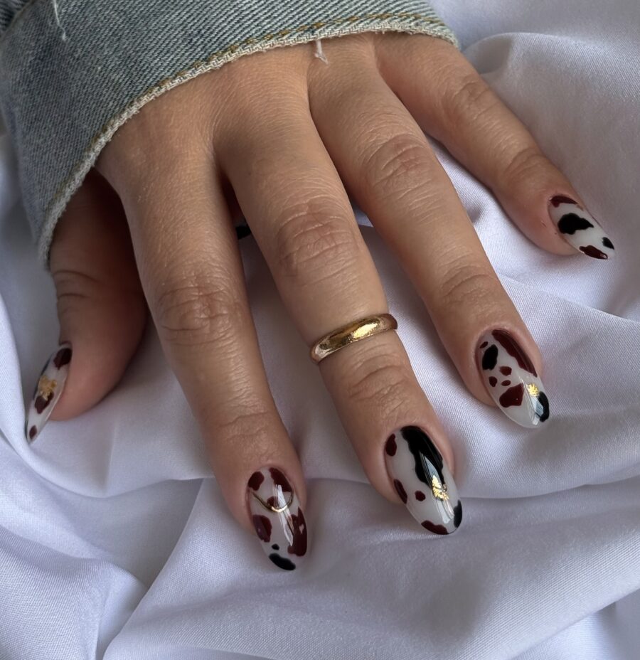 Trendy cow print nail art style