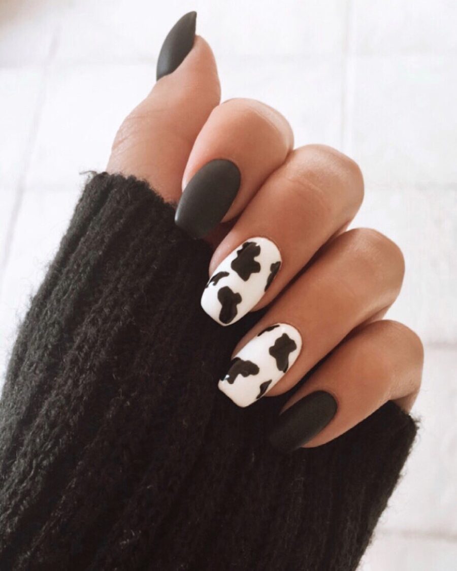 Chic cow print nails for bold style