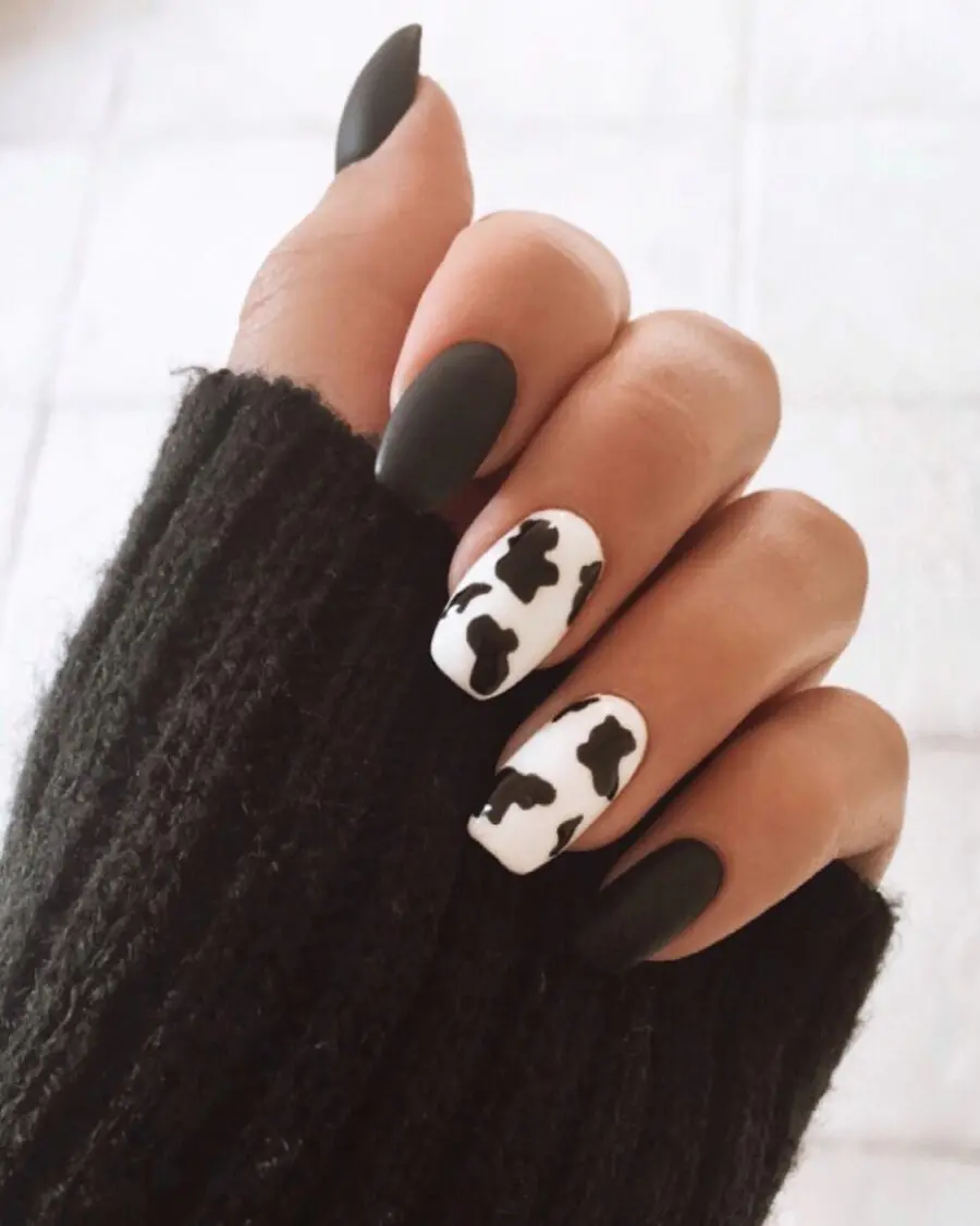 Chic cow print nails for bold style