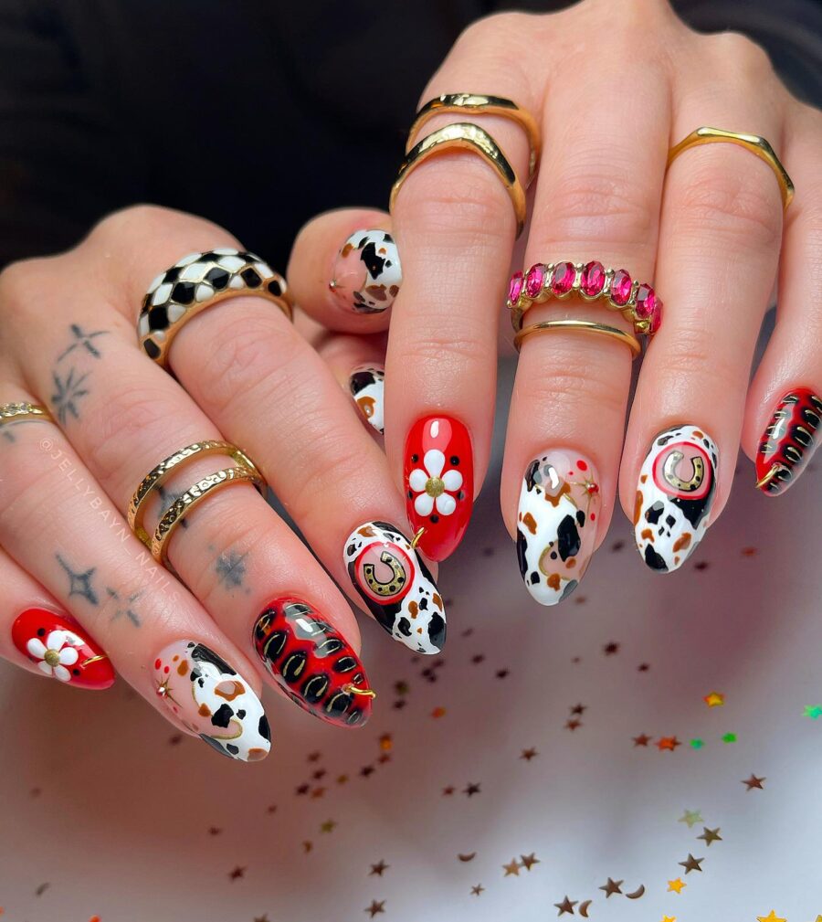 Trendy cow print nails with vibrant accents