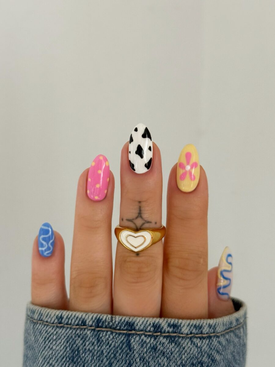 Fun Cow Print Nails with Colorful Accents