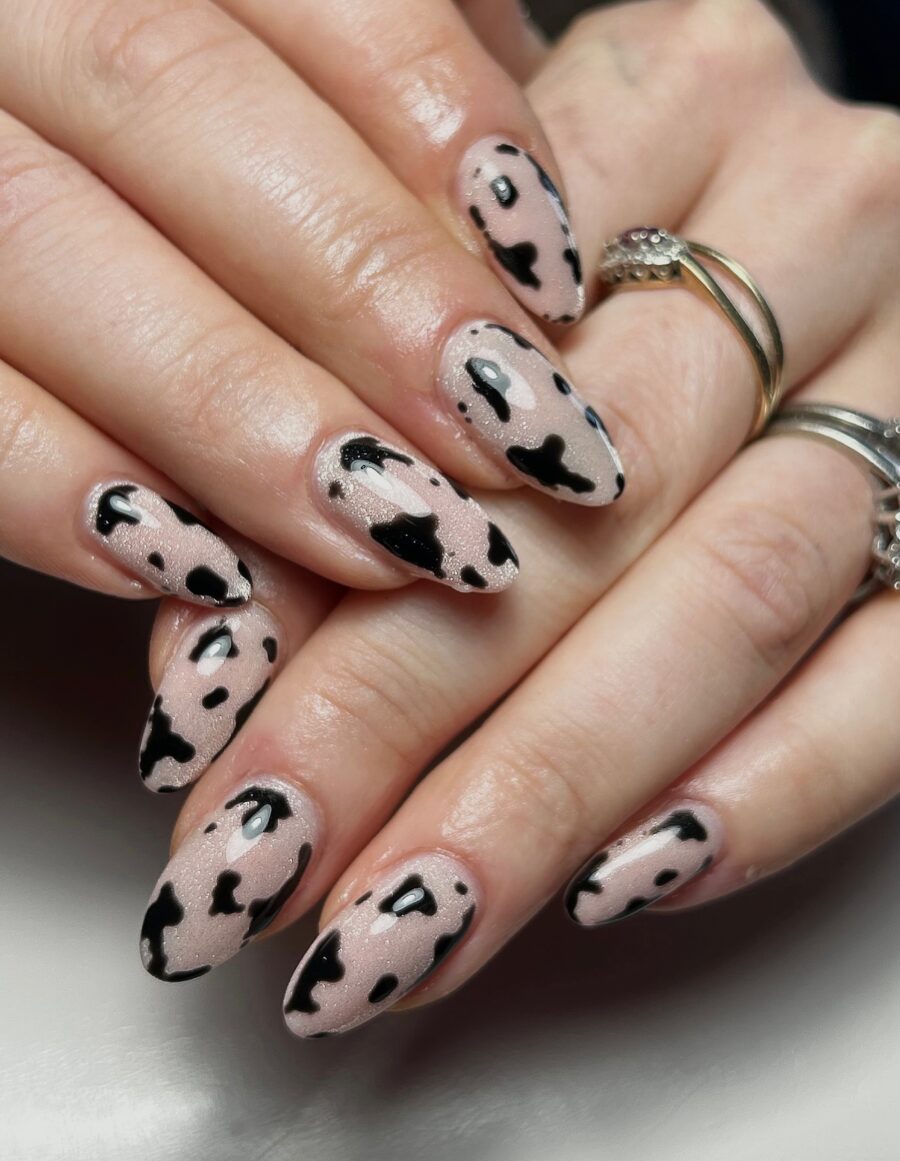 Chic cow print nails for a trendy look