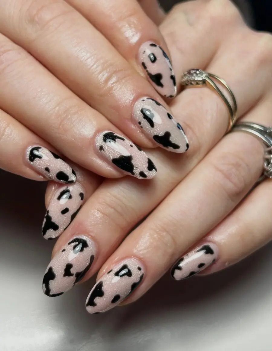 Chic cow print nails for a trendy look
