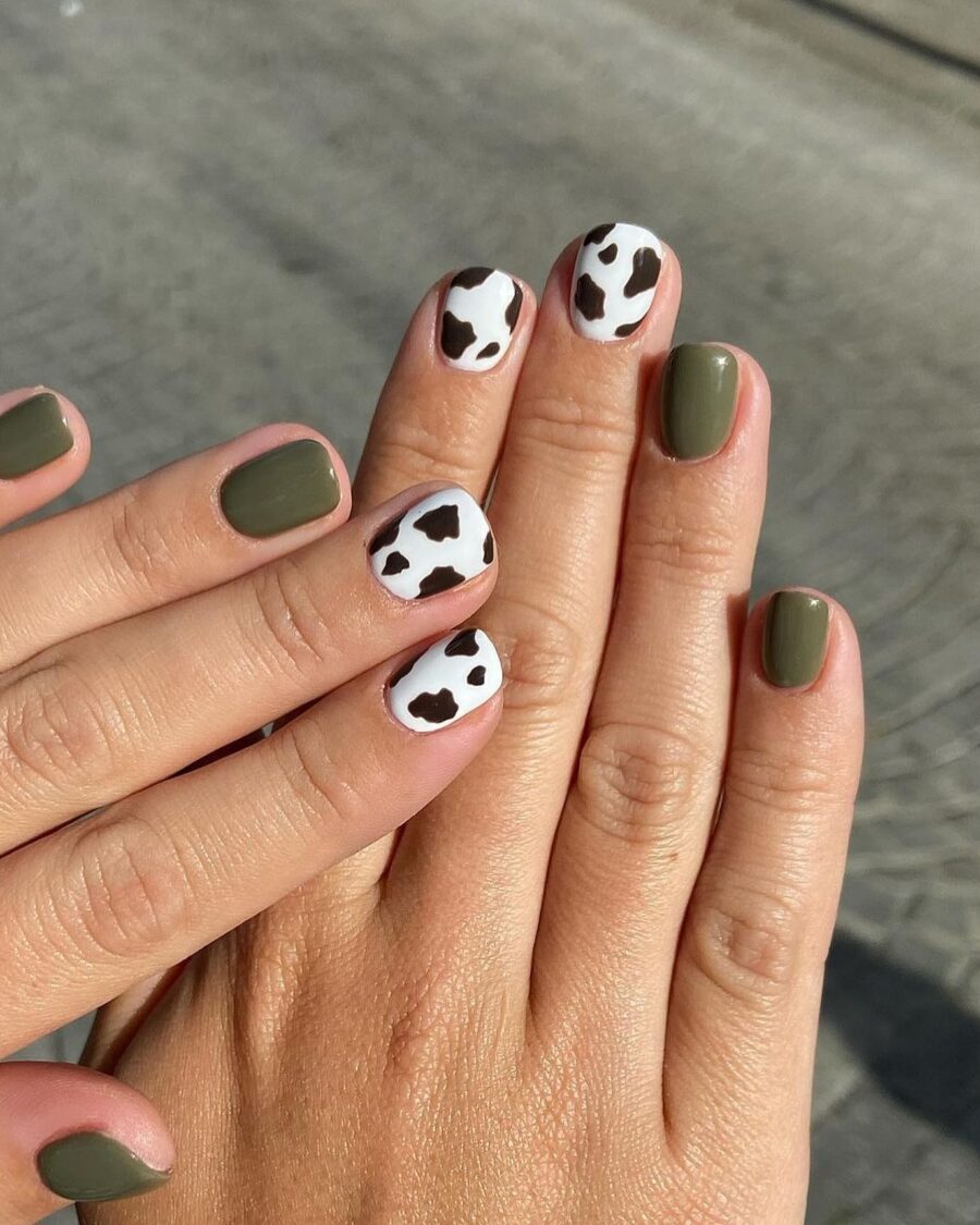 Chic cow print nails with earthy tones
