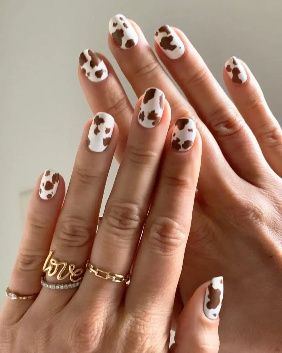 Chic Cow Print Nail Art Design for Trendsetters
