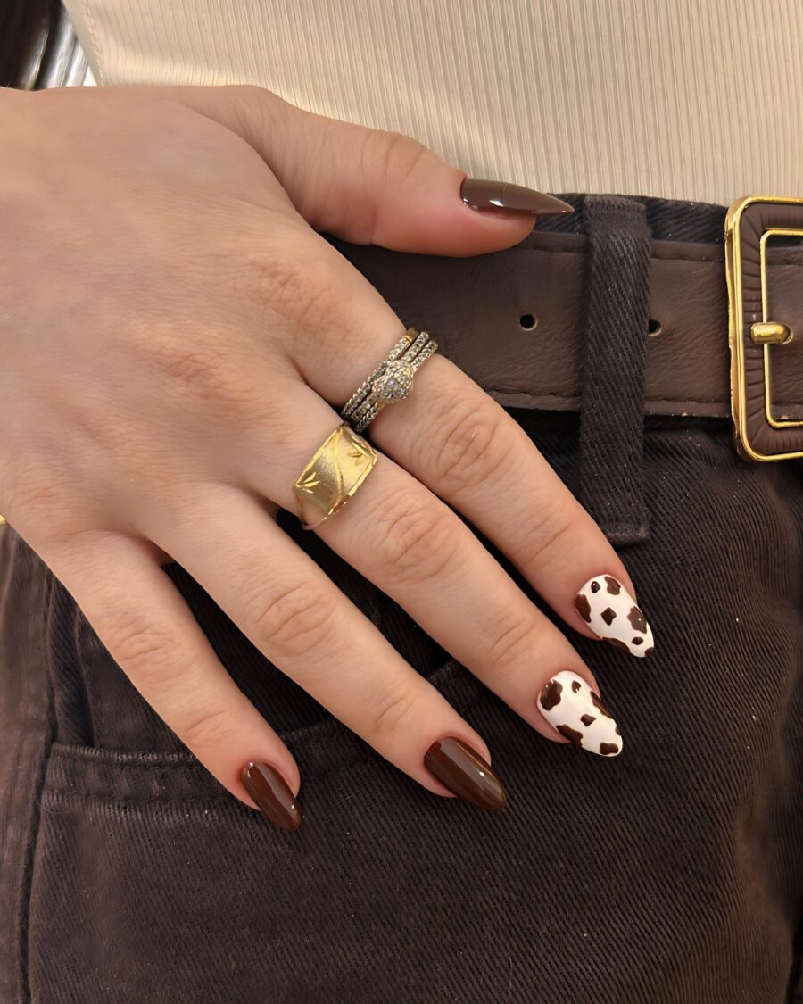 Stylish brown and white cow print nails