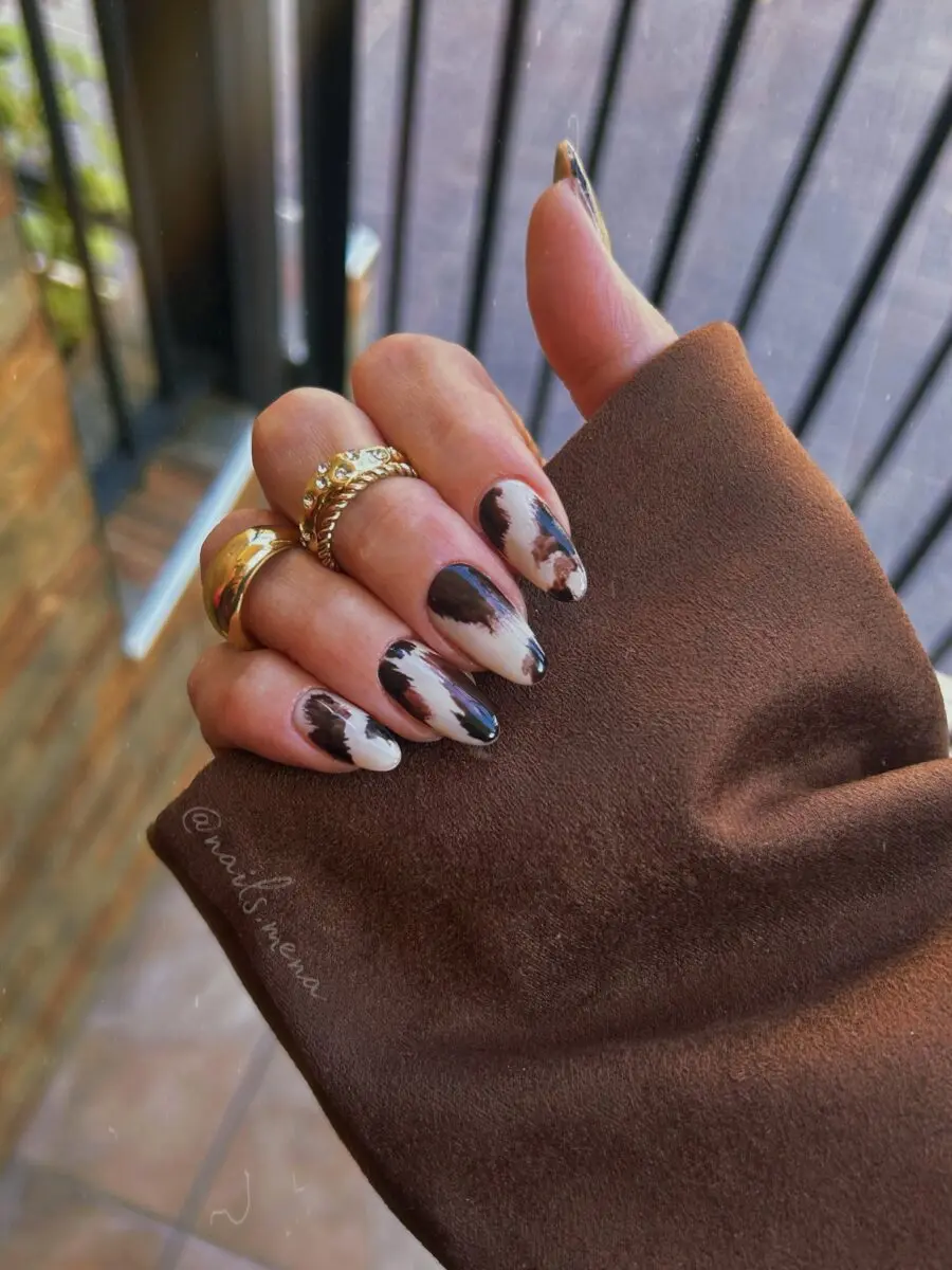 Chic Cow Print Nail Art for Trendsetters