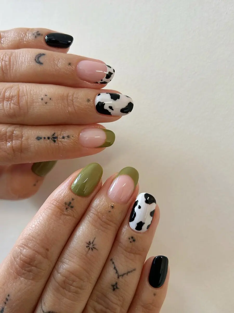 Trendy cow print nail art for chic vibes