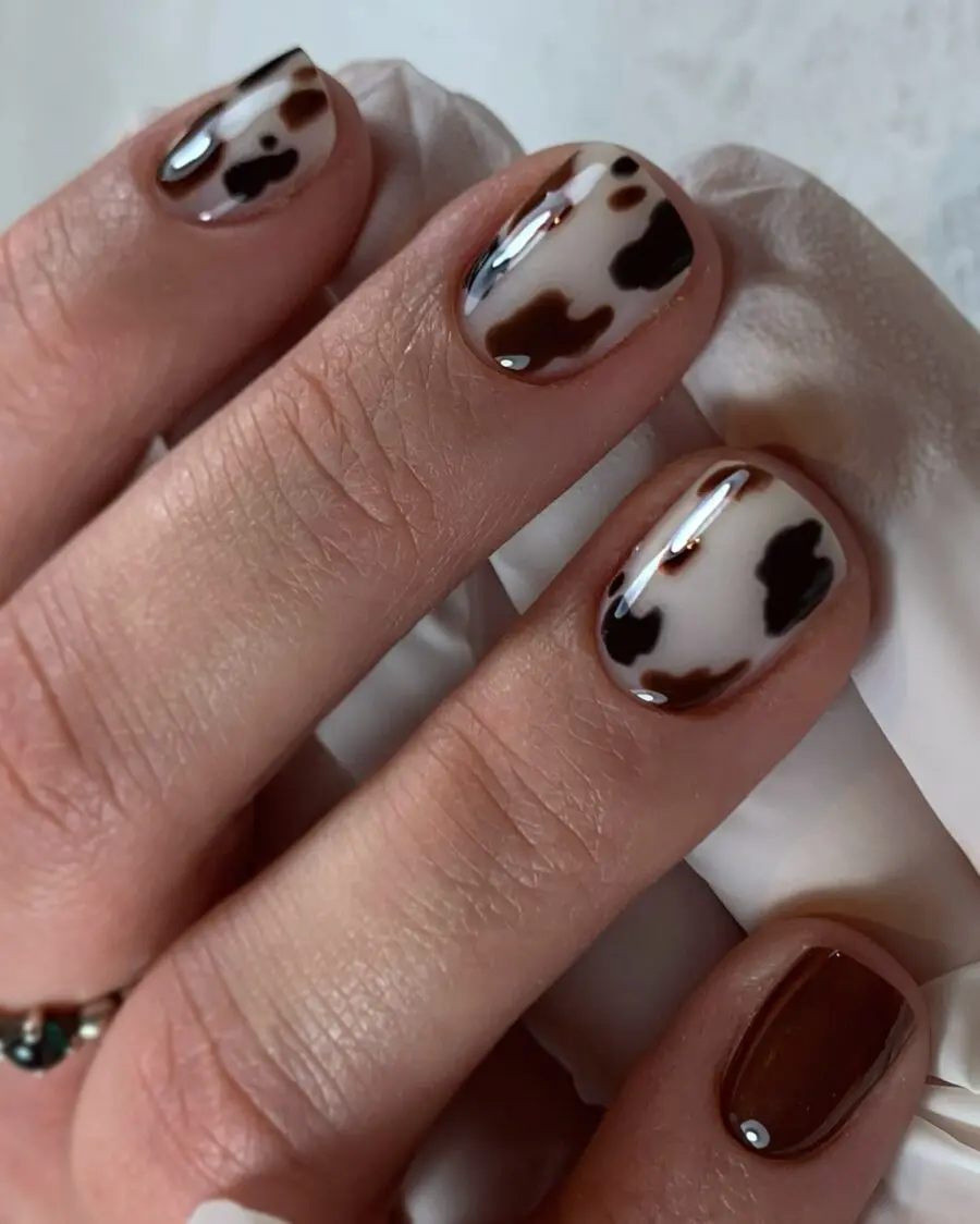 Chic cow print nails for a playful vibe