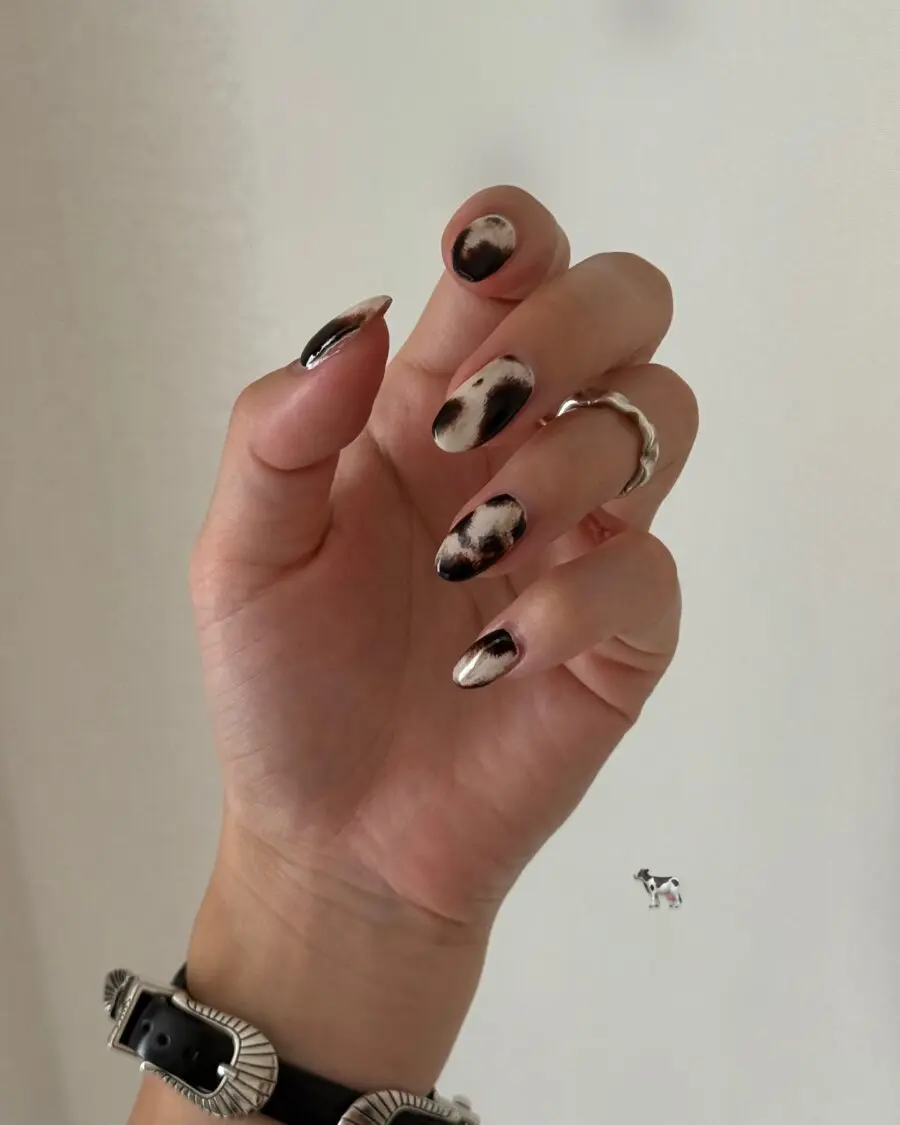Trendy cow print nails for chic style