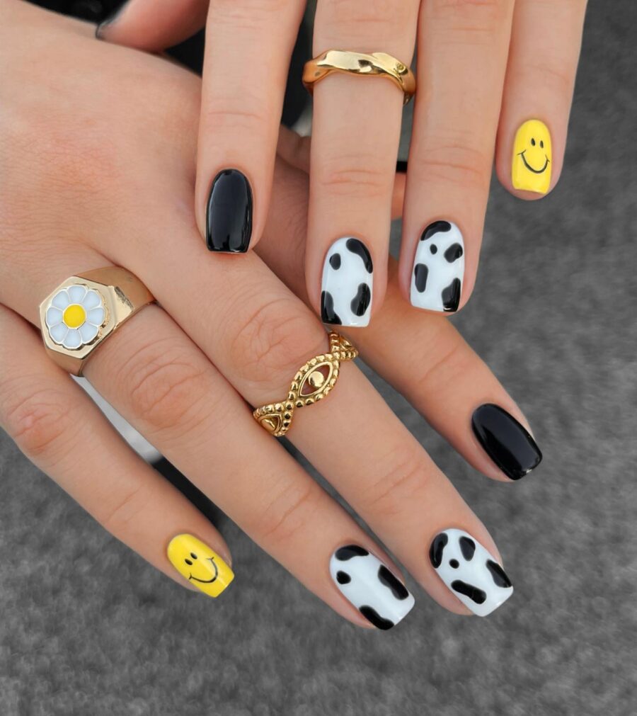 Chic Cow Print Nails with a Playful Twist